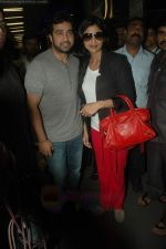 Shilpa Shetty, Raj Kundra snapped at International Airport, Mumbai on 27th Aug 2011 (13).JPG